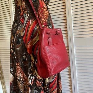 Unique vintage Coach bag.  Light wear, clean inside and in good used condition.